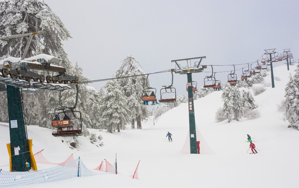 troodos-mountains-ski-lifts-cable-cars-going-up-mountain-bringing-snowboarders-ski-slopes