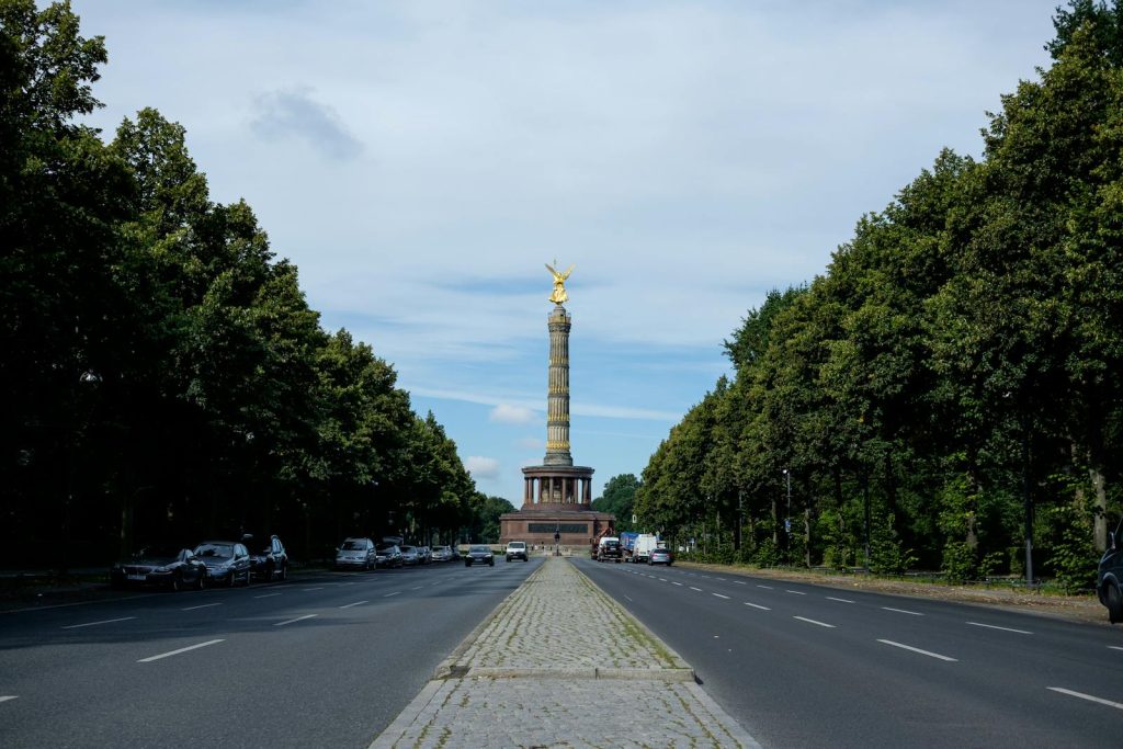 A view of a monument in the middle of a road