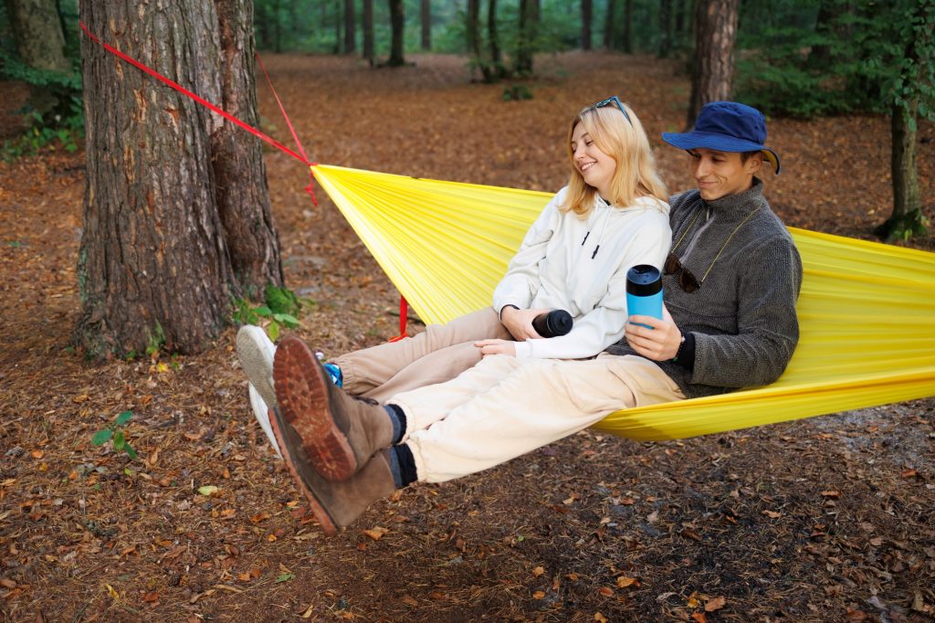 Nature Retreat: Couple Relaxing by Hammock