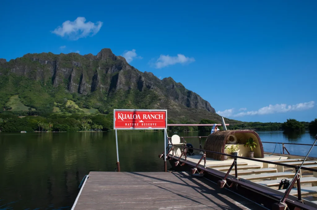Beautiful view of Kualoa Ranch with majestic mountains and tranquil waters in Hawaii.