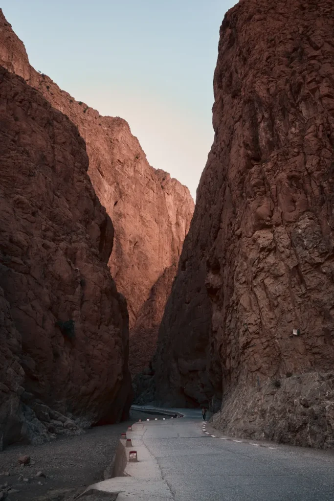 Discover the breathtaking beauty of Todgha Gorge in Morocco with towering rock formations at sunrise.