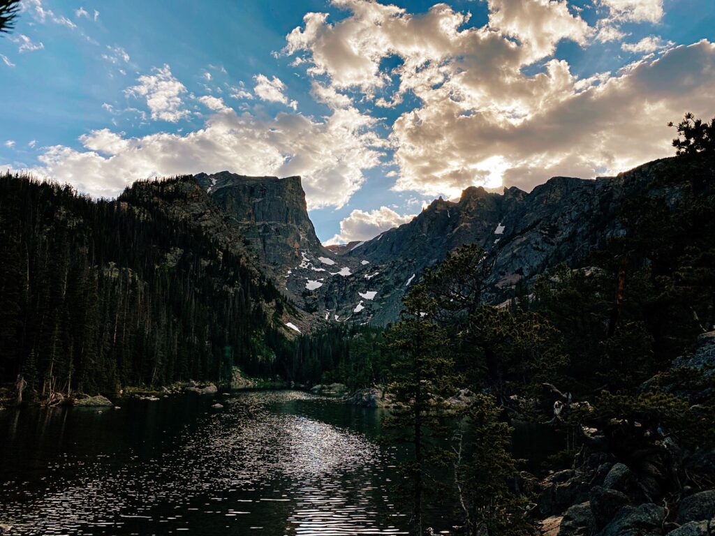 Dramatic landscape of Emerald Lake in Rocky Mountain National Park at sunset.