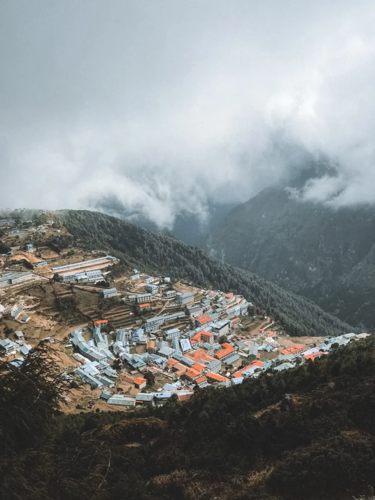 Explore the breathtaking aerial view of Namche Bazaar, nestled in the heart of the Himalayas, Nepal.