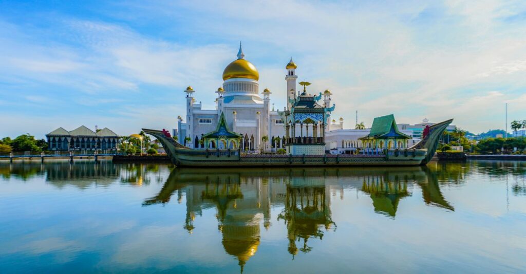 Stunning view of Omar Ali Saifuddien Mosque with its reflection on calm waters in Brunei.