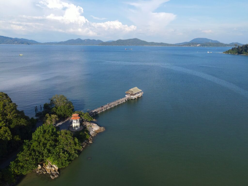 A stunning aerial view of the jetty at Pangkor Island, Malaysia, with serene ocean vistas.
