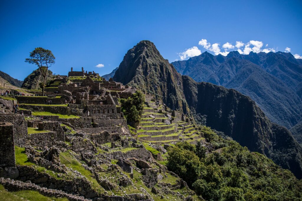 Discover the breathtaking beauty of Machu Picchu's ancient ruins set against the majestic Andes mountains in Peru.