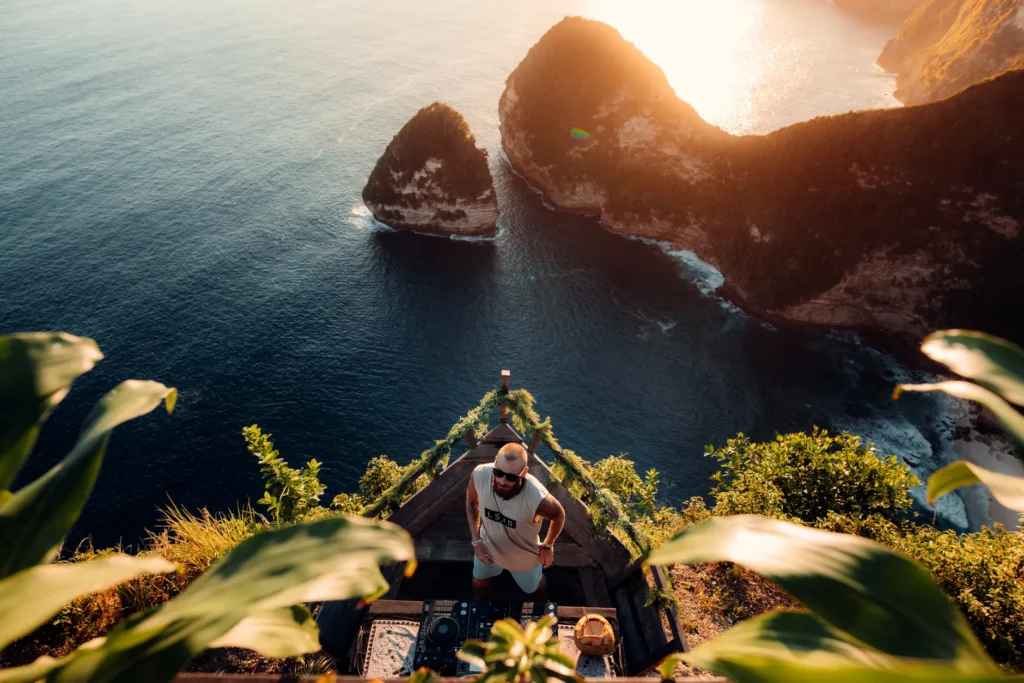 Experience the breathtaking sunset over Nusa Penida with a stunning view from the cliffside.