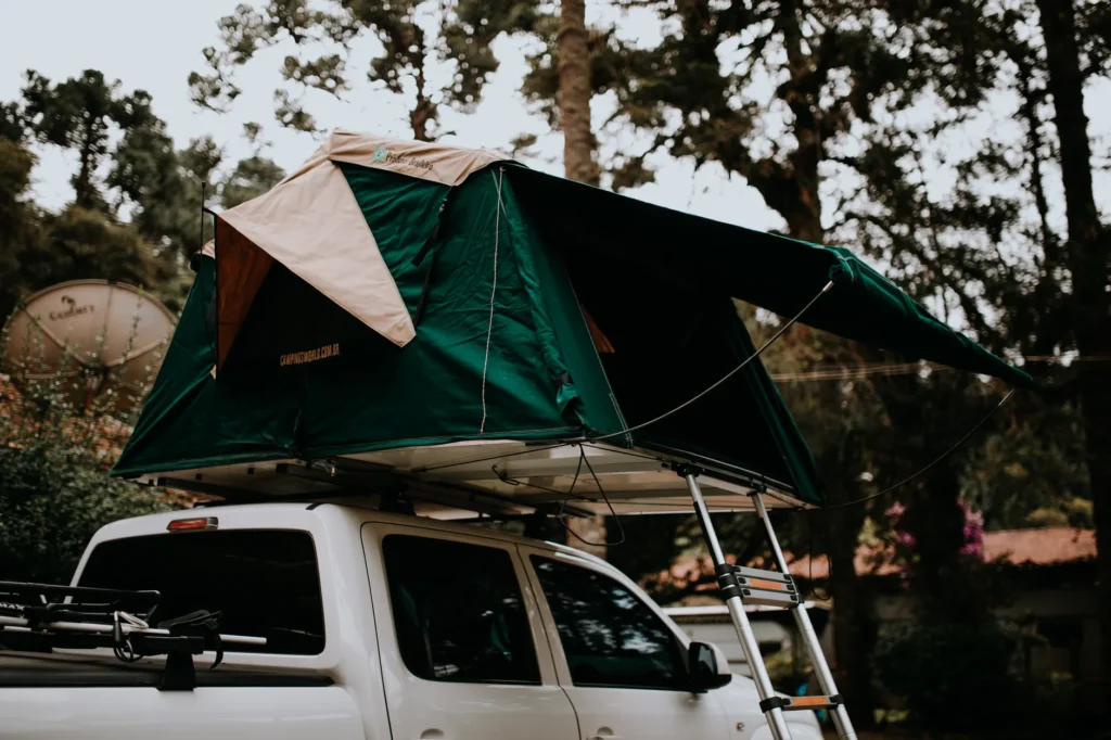 Explore scenic adventures with a rooftop tent on a pickup truck for ultimate outdoor camping.