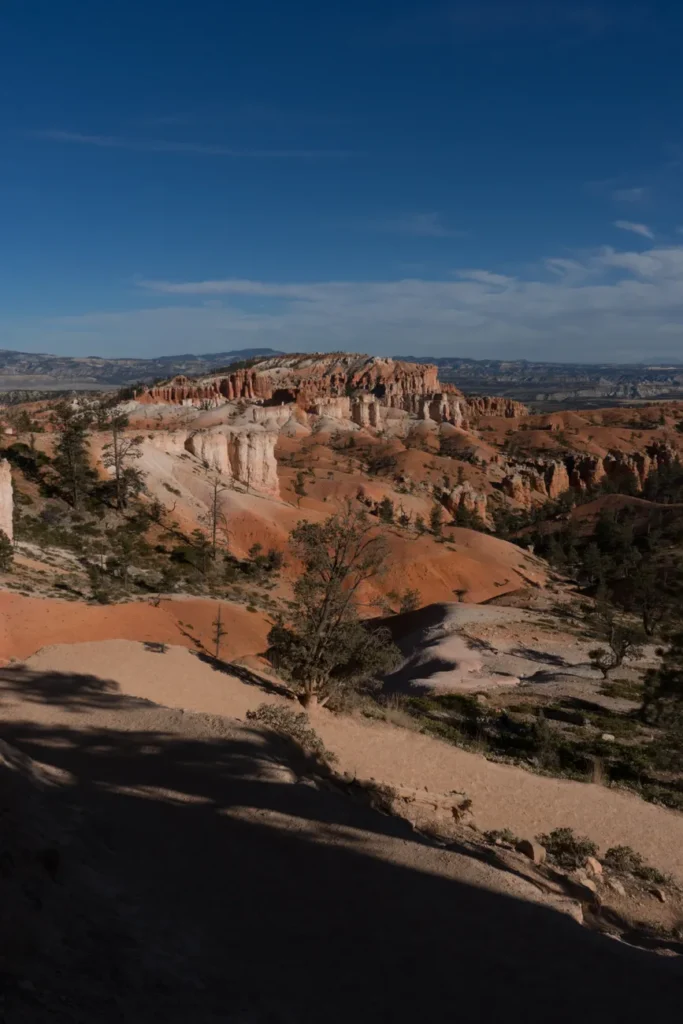 Majestic view of Bryce Canyon's unique rock formations under a clear blue sky in Utah.
