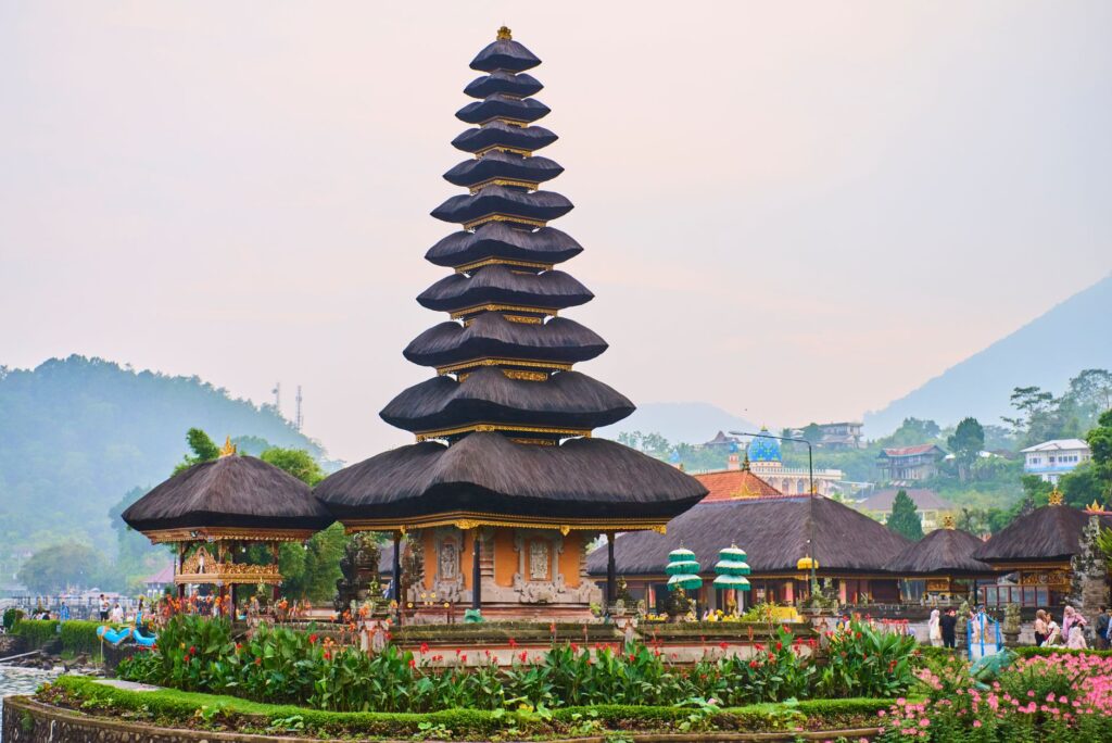Scenic view of Pura Ulun Danu Bratan temple and gardens in Bali, Indonesia during daylight.